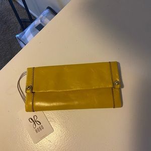 NWT HOBO clutch and wallet. Genuine leather. Color: yellow